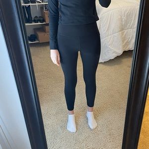 Athleta ultra high rise salutation stash 7/8 black size medium